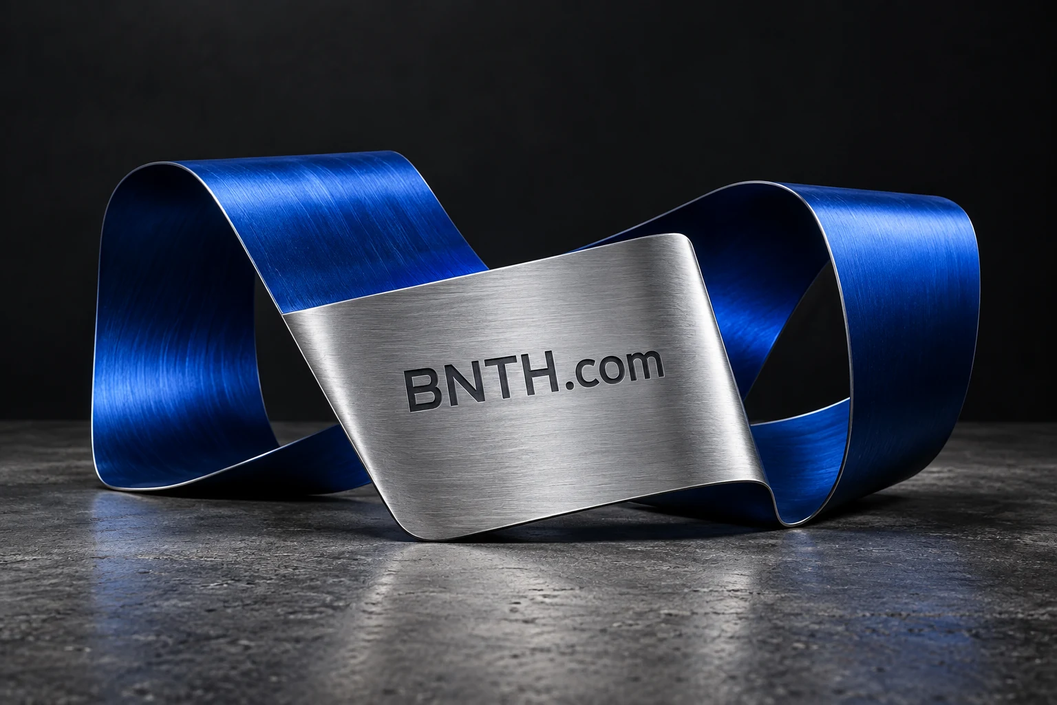 BNTH.com lettering on sculptural brushed metal with ultramarine folds